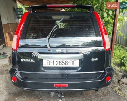Черный Ниссан ИксТрейл, объемом двигателя 2.49 л и пробегом 195 тыс. км за 5200 $, фото 3 на Automoto.ua
