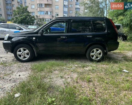 Чорний Ніссан ІксТрейл, об'ємом двигуна 2.49 л та пробігом 256 тис. км за 7000 $, фото 2 на Automoto.ua