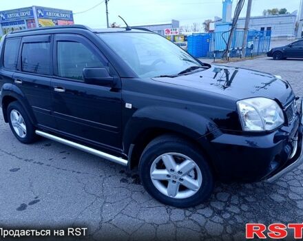 Черный Ниссан ИксТрейл, объемом двигателя 2.5 л и пробегом 170 тыс. км за 8600 $, фото 7 на Automoto.ua