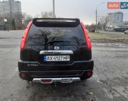 Черный Ниссан ИксТрейл, объемом двигателя 2.49 л и пробегом 185 тыс. км за 9100 $, фото 5 на Automoto.ua