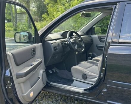 Черный Ниссан ИксТрейл, объемом двигателя 2.2 л и пробегом 208 тыс. км за 3799 $, фото 4 на Automoto.ua