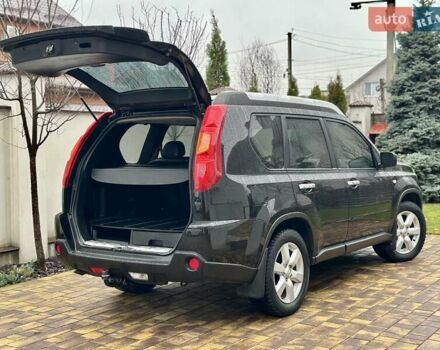 Черный Ниссан ИксТрейл, объемом двигателя 2 л и пробегом 264 тыс. км за 11250 $, фото 32 на Automoto.ua