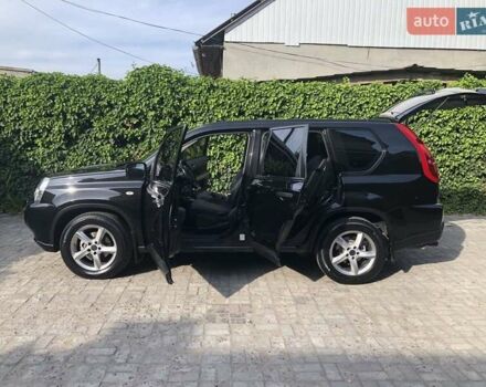 Черный Ниссан ИксТрейл, объемом двигателя 2 л и пробегом 140 тыс. км за 11600 $, фото 38 на Automoto.ua