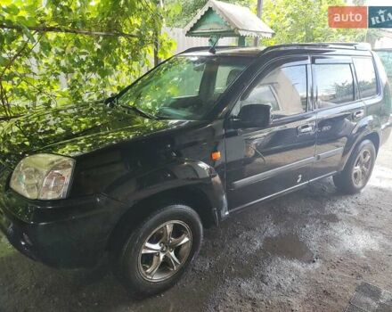 Черный Ниссан ИксТрейл, объемом двигателя 2.49 л и пробегом 195 тыс. км за 5200 $, фото 1 на Automoto.ua