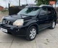 Черный Ниссан ИксТрейл, объемом двигателя 2 л и пробегом 295 тыс. км за 8090 $, фото 2 на Automoto.ua