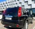 Черный Ниссан ИксТрейл, объемом двигателя 2 л и пробегом 190 тыс. км за 8700 $, фото 1 на Automoto.ua