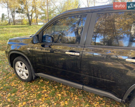 Черный Ниссан ИксТрейл, объемом двигателя 2 л и пробегом 214 тыс. км за 11500 $, фото 2 на Automoto.ua