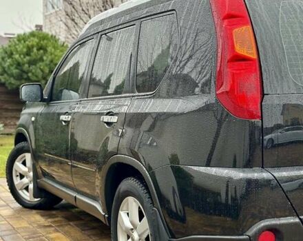 Черный Ниссан ИксТрейл, объемом двигателя 2 л и пробегом 264 тыс. км за 11250 $, фото 26 на Automoto.ua