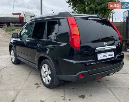 Черный Ниссан ИксТрейл, объемом двигателя 2 л и пробегом 295 тыс. км за 8090 $, фото 6 на Automoto.ua