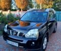 Чорний Ніссан ІксТрейл, об'ємом двигуна 2 л та пробігом 330 тис. км за 9300 $, фото 1 на Automoto.ua