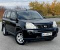 Черный Ниссан ИксТрейл, объемом двигателя 2 л и пробегом 326 тыс. км за 8500 $, фото 1 на Automoto.ua