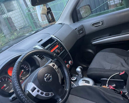 Черный Ниссан ИксТрейл, объемом двигателя 2.5 л и пробегом 236 тыс. км за 8600 $, фото 11 на Automoto.ua