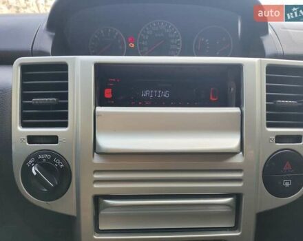 Черный Ниссан ИксТрейл, объемом двигателя 2.49 л и пробегом 195 тыс. км за 5200 $, фото 8 на Automoto.ua