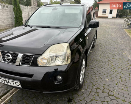 Черный Ниссан ИксТрейл, объемом двигателя 2.49 л и пробегом 169 тыс. км за 8750 $, фото 4 на Automoto.ua
