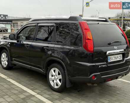 Черный Ниссан ИксТрейл, объемом двигателя 2.49 л и пробегом 197 тыс. км за 8888 $, фото 6 на Automoto.ua