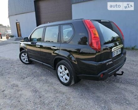 Чорний Ніссан ІксТрейл, об'ємом двигуна 2 л та пробігом 290 тис. км за 11700 $, фото 4 на Automoto.ua