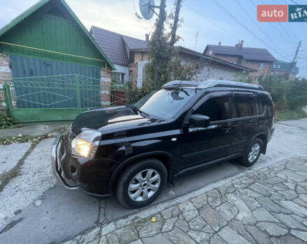 Черный Ниссан ИксТрейл, объемом двигателя 2.5 л и пробегом 236 тыс. км за 8600 $, фото 2 на Automoto.ua