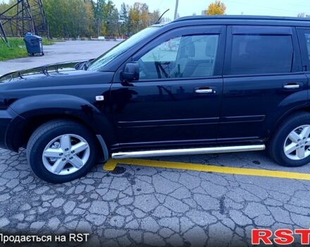 Черный Ниссан ИксТрейл, объемом двигателя 2.5 л и пробегом 170 тыс. км за 8600 $, фото 1 на Automoto.ua