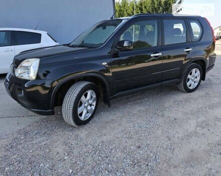 Чорний Ніссан ІксТрейл, об'ємом двигуна 2 л та пробігом 290 тис. км за 11700 $, фото 3 на Automoto.ua