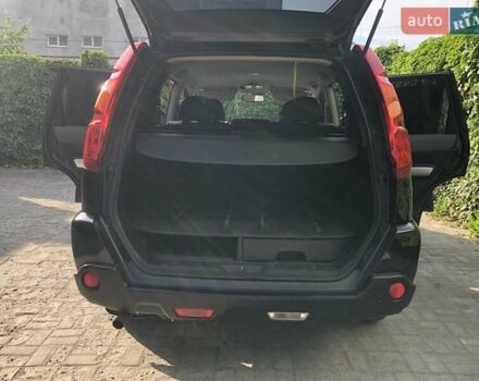 Черный Ниссан ИксТрейл, объемом двигателя 2 л и пробегом 140 тыс. км за 11600 $, фото 7 на Automoto.ua