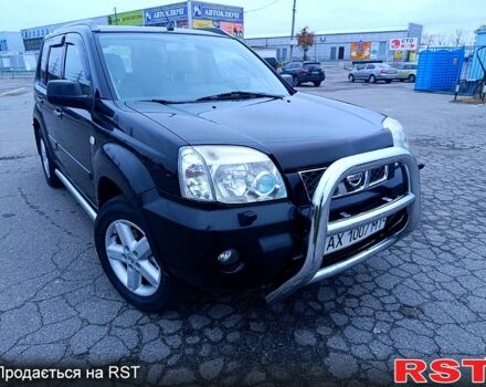 Черный Ниссан ИксТрейл, объемом двигателя 2.5 л и пробегом 170 тыс. км за 8600 $, фото 4 на Automoto.ua