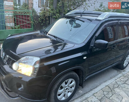 Черный Ниссан ИксТрейл, объемом двигателя 2.5 л и пробегом 236 тыс. км за 8600 $, фото 9 на Automoto.ua