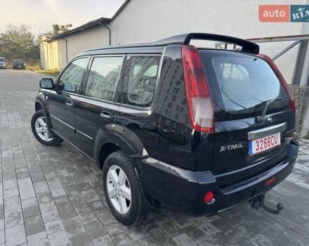 Чорний Ніссан ІксТрейл, об'ємом двигуна 2.2 л та пробігом 295 тис. км за 3850 $, фото 2 на Automoto.ua