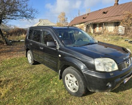 Черный Ниссан ИксТрейл, объемом двигателя 2.2 л и пробегом 206 тыс. км за 4000 $, фото 2 на Automoto.ua