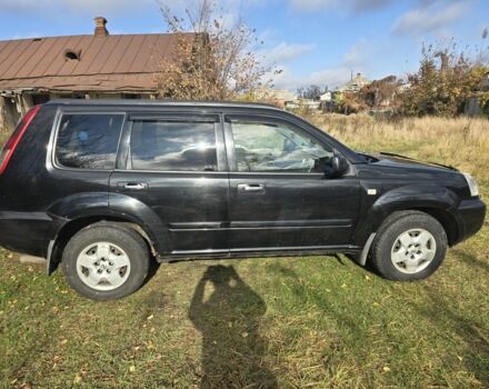 Черный Ниссан ИксТрейл, объемом двигателя 2.2 л и пробегом 206 тыс. км за 4000 $, фото 5 на Automoto.ua