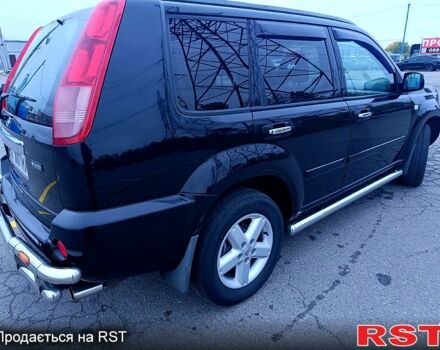 Черный Ниссан ИксТрейл, объемом двигателя 2.5 л и пробегом 170 тыс. км за 8600 $, фото 5 на Automoto.ua