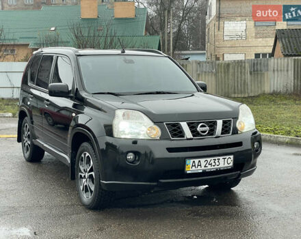 Черный Ниссан ИксТрейл, объемом двигателя 2 л и пробегом 210 тыс. км за 8750 $, фото 1 на Automoto.ua