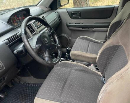 Чорний Ніссан ІксТрейл, об'ємом двигуна 2.2 л та пробігом 311 тис. км за 3500 $, фото 7 на Automoto.ua