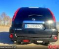 Черный Ниссан ИксТрейл, объемом двигателя 2 л и пробегом 258 тыс. км за 9200 $, фото 1 на Automoto.ua