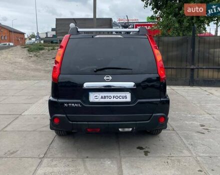 Черный Ниссан ИксТрейл, объемом двигателя 2 л и пробегом 295 тыс. км за 8090 $, фото 5 на Automoto.ua