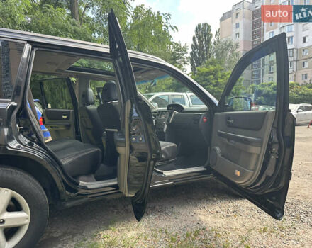 Чорний Ніссан ІксТрейл, об'ємом двигуна 2.49 л та пробігом 256 тис. км за 7000 $, фото 7 на Automoto.ua