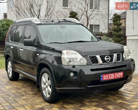 Черный Ниссан ИксТрейл, объемом двигателя 2 л и пробегом 264 тыс. км за 11250 $, фото 1 на Automoto.ua