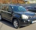 Черный Ниссан ИксТрейл, объемом двигателя 2 л и пробегом 240 тыс. км за 9800 $, фото 1 на Automoto.ua