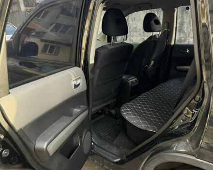 Черный Ниссан ИксТрейл, объемом двигателя 2 л и пробегом 210 тыс. км за 8500 $, фото 4 на Automoto.ua