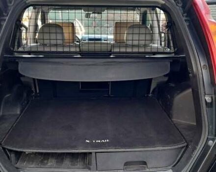 Черный Ниссан ИксТрейл, объемом двигателя 2 л и пробегом 259 тыс. км за 9999 $, фото 16 на Automoto.ua