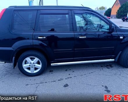 Черный Ниссан ИксТрейл, объемом двигателя 2.5 л и пробегом 170 тыс. км за 8600 $, фото 6 на Automoto.ua