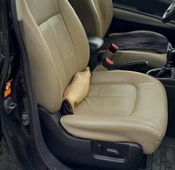 Черный Ниссан ИксТрейл, объемом двигателя 2 л и пробегом 259 тыс. км за 9999 $, фото 12 на Automoto.ua