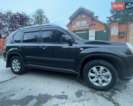 Черный Ниссан ИксТрейл, объемом двигателя 2.5 л и пробегом 236 тыс. км за 8600 $, фото 3 на Automoto.ua