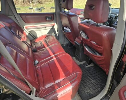 Черный Ниссан ИксТрейл, объемом двигателя 2.2 л и пробегом 206 тыс. км за 4000 $, фото 8 на Automoto.ua