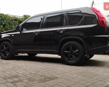 Черный Ниссан ИксТрейл, объемом двигателя 2 л и пробегом 140 тыс. км за 11600 $, фото 1 на Automoto.ua