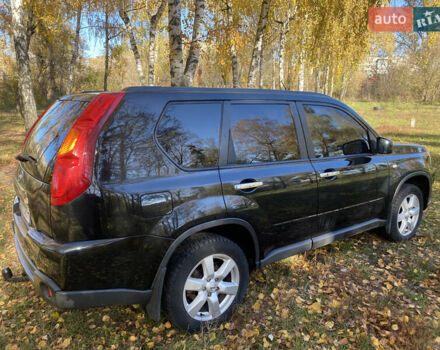 Черный Ниссан ИксТрейл, объемом двигателя 2 л и пробегом 214 тыс. км за 11500 $, фото 6 на Automoto.ua