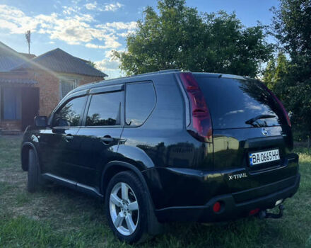 Чорний Ніссан ІксТрейл, об'ємом двигуна 2 л та пробігом 200 тис. км за 10400 $, фото 2 на Automoto.ua