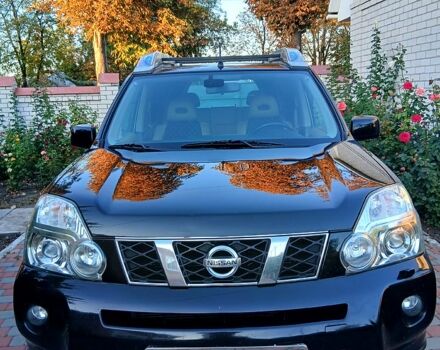Чорний Ніссан ІксТрейл, об'ємом двигуна 2 л та пробігом 330 тис. км за 9300 $, фото 2 на Automoto.ua
