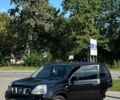 Чорний Ніссан ІксТрейл, об'ємом двигуна 2 л та пробігом 230 тис. км за 8150 $, фото 2 на Automoto.ua