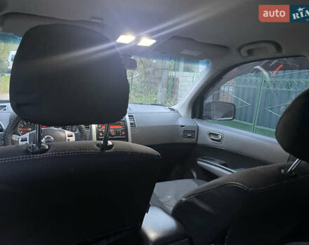 Черный Ниссан ИксТрейл, объемом двигателя 2.5 л и пробегом 236 тыс. км за 8600 $, фото 22 на Automoto.ua