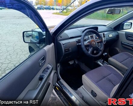 Черный Ниссан ИксТрейл, объемом двигателя 2.5 л и пробегом 170 тыс. км за 8600 $, фото 9 на Automoto.ua